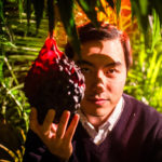 Director Yung Chang with a "proto-fruit" prop during one of the in-studio re-creation shoots.